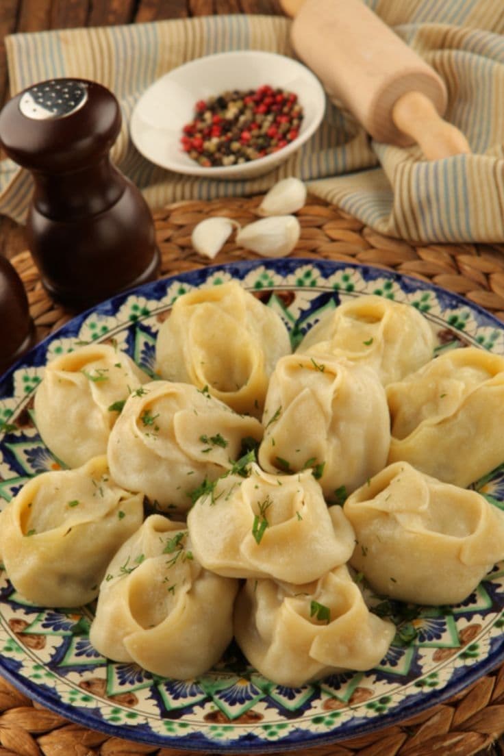 Manti dumplings prepared in steamer tiers